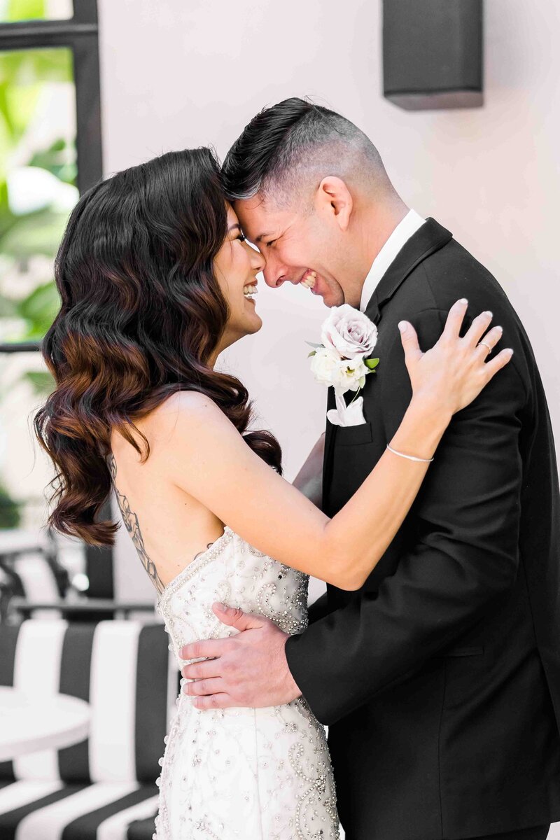 bride and groom laughing at their Guild Hotel Wedding