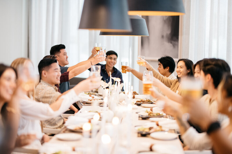 Dinner guests toasting