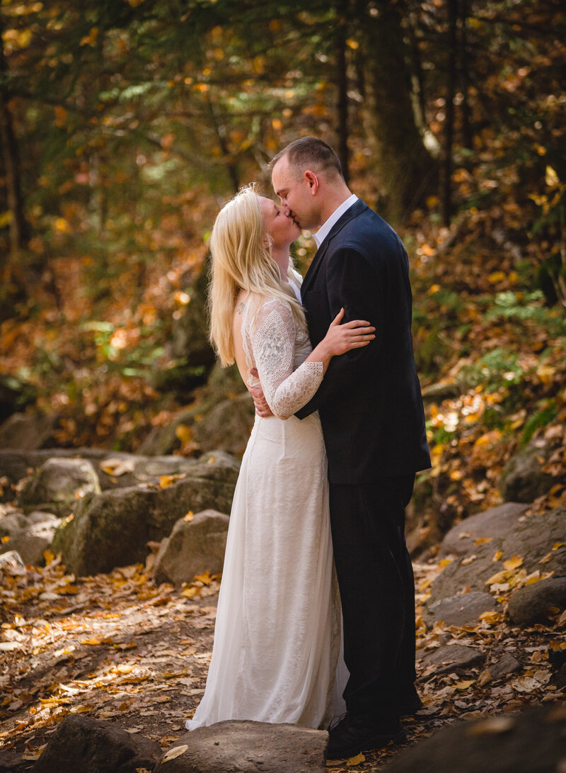 elopement couple in New England river