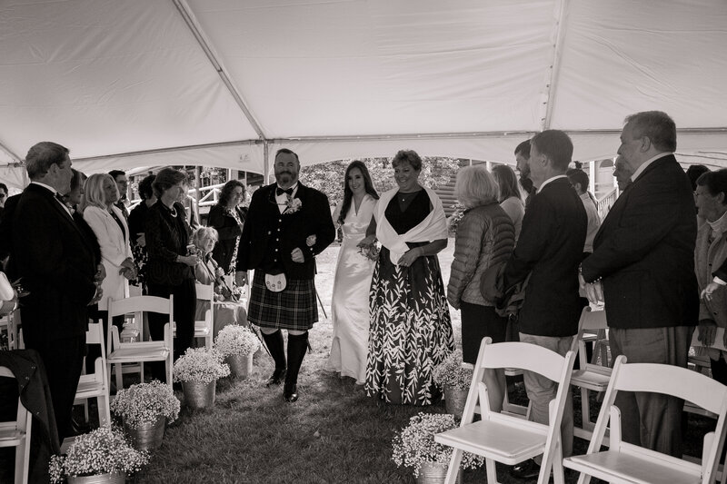 Bride and Parents walking down aisle | Wedding Photography taken by Heidi