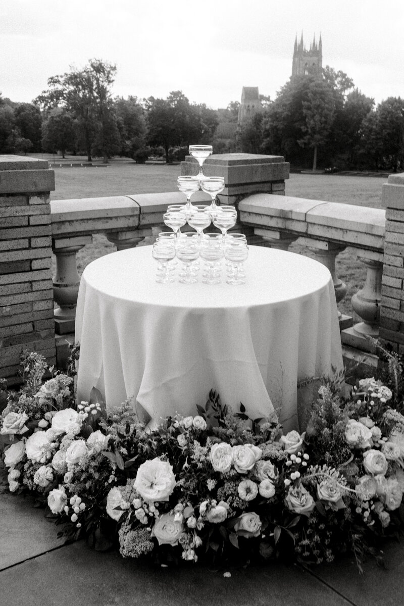 Tiffany Longeway Photography captures the elegant champagne tower setup amidst the historic charm and beautiful gardens of The Berkeley City Club in Berkeley, California. The classic architecture and picturesque surroundings create a stunning backdrop