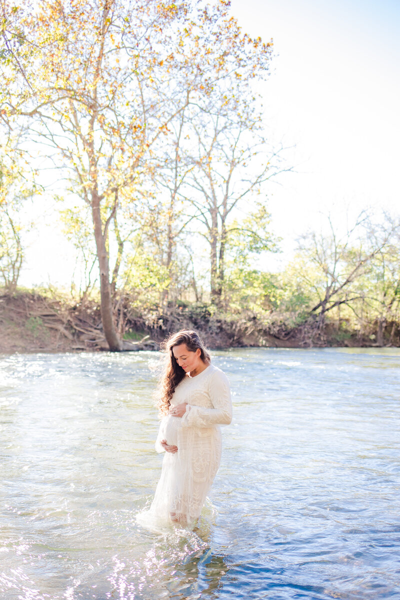 Beautiful maternity photography in Harrisonburg, VA, with natural light highlighting the joy of pregnancy