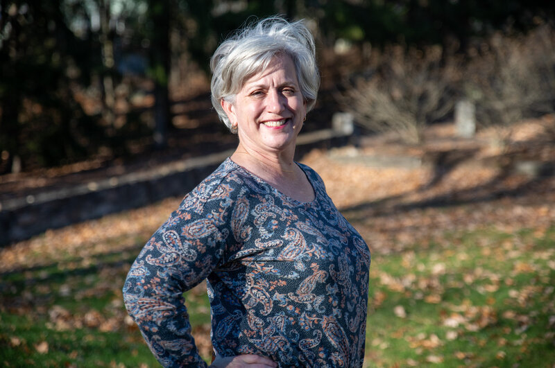 Dr. Ann Miller smiling and posing for a photo.