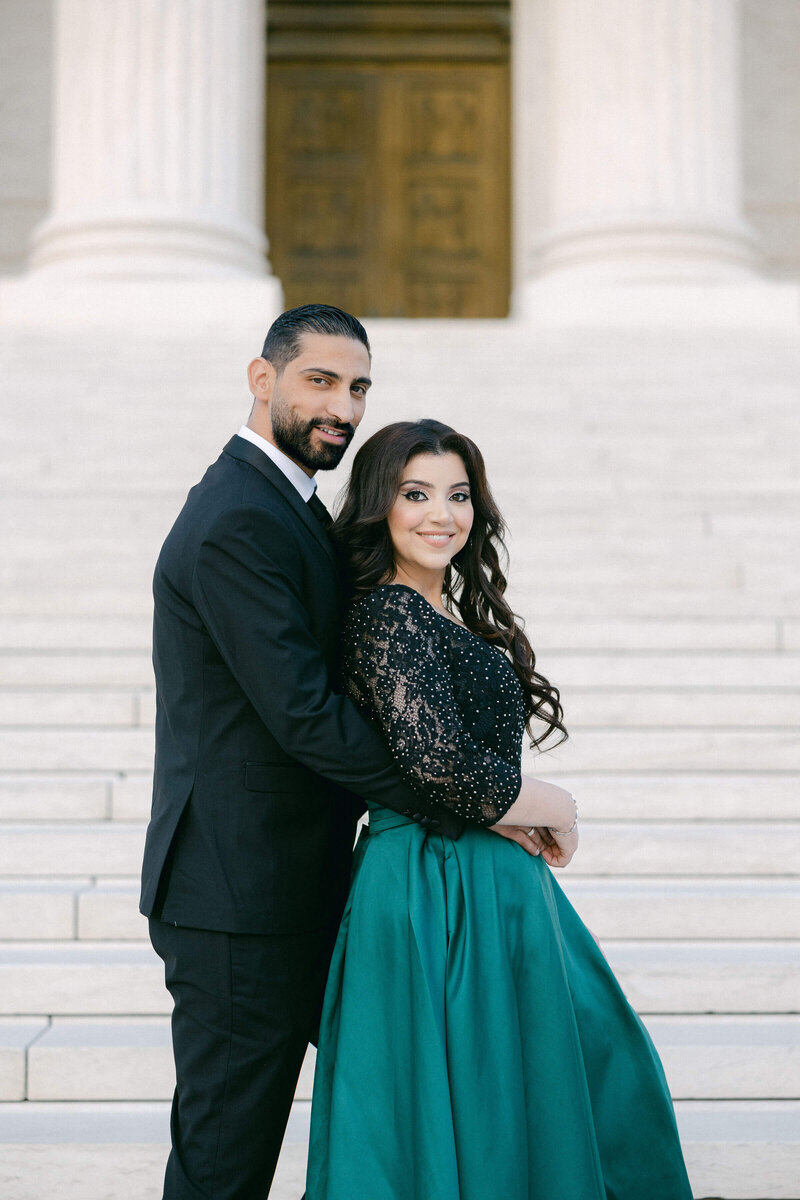 A stunning couple poses for an elegant engagement session at the Supreme Courthouse in Washington DC, captured by Get Ready Photo.