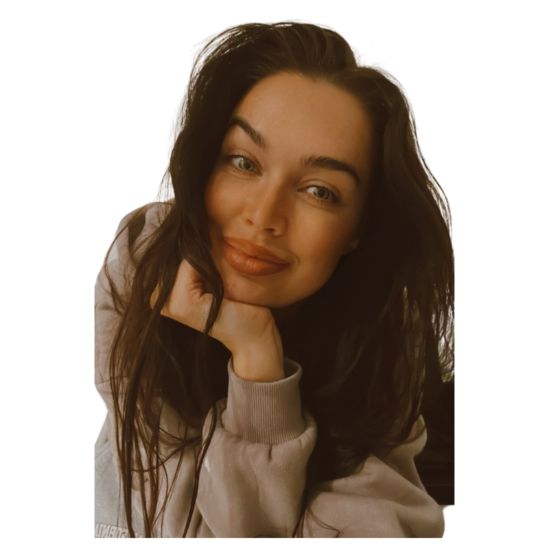 Cutout picture of a girl named Megan Reilly smiling with her hand on her face
