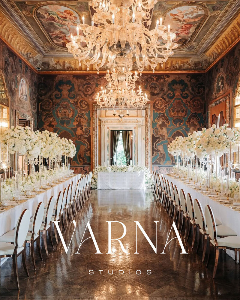 Sophisticated logo design over a destination wedding event image for a luxury photographer.