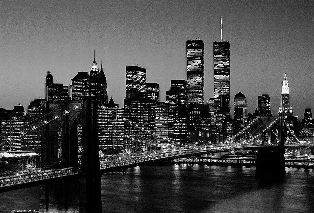 Black and white photo of city skyline symbolizing ambition, growth, and the freedom that comes from building an authority-based business.