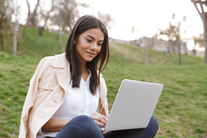 Woman confident on laptop