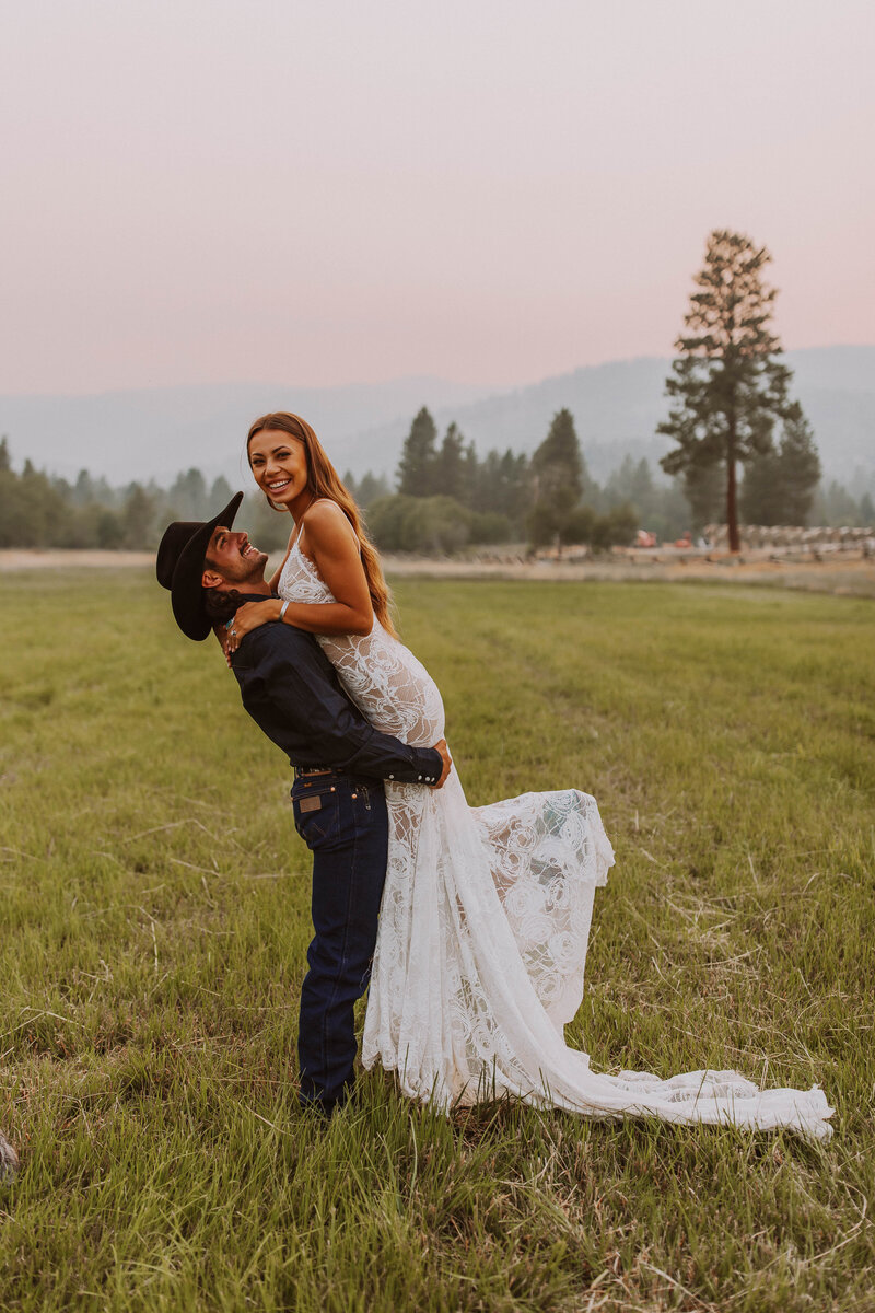Cowboy and bride in lace tight wedding dress