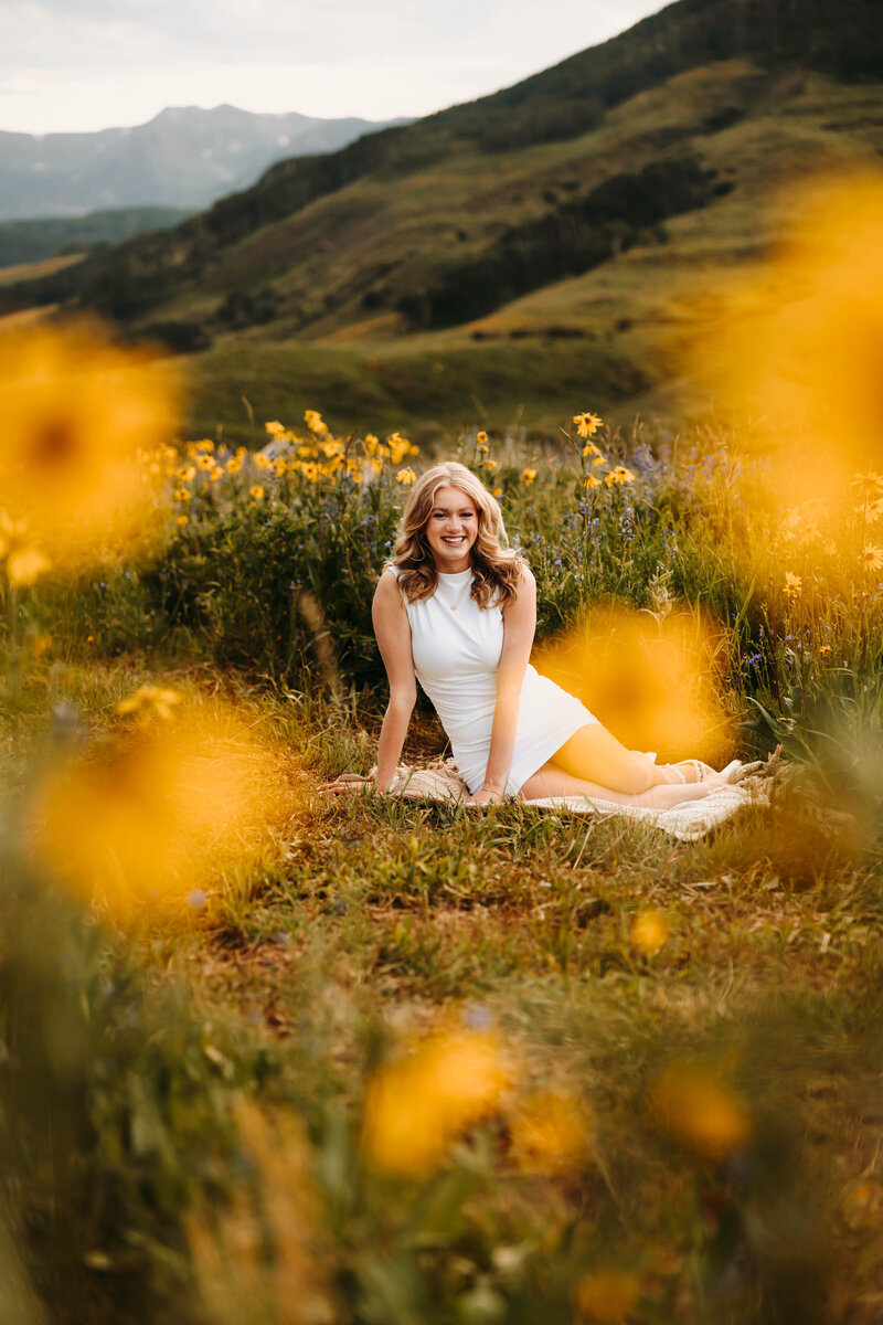 Senior poses with her horses in Montrose, Colorado
