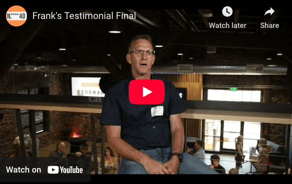 Frank Elias sharing his Vintage One testimonial on video at a Normal 40 in-person mastermind event