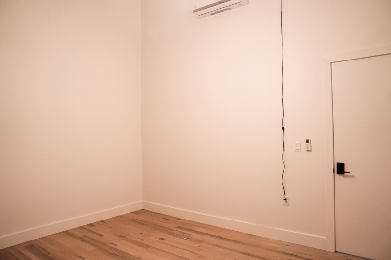 Unfurnished therapy and bodywork office for rent in Greenpoint, Brooklyn with new wood floors.