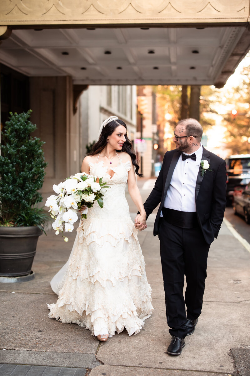 Tattood couple walks out of lucury hotel wedding in Richmond, VA