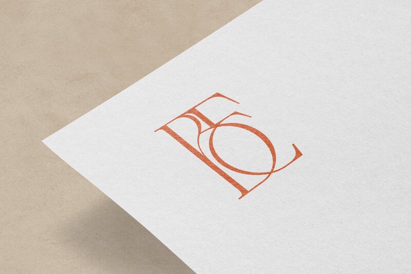 A white piece of paper with the initials "BEP" printed in orange in the top left corner, featuring an elegant and stylized font design—a perfect touch for branding for photographers.