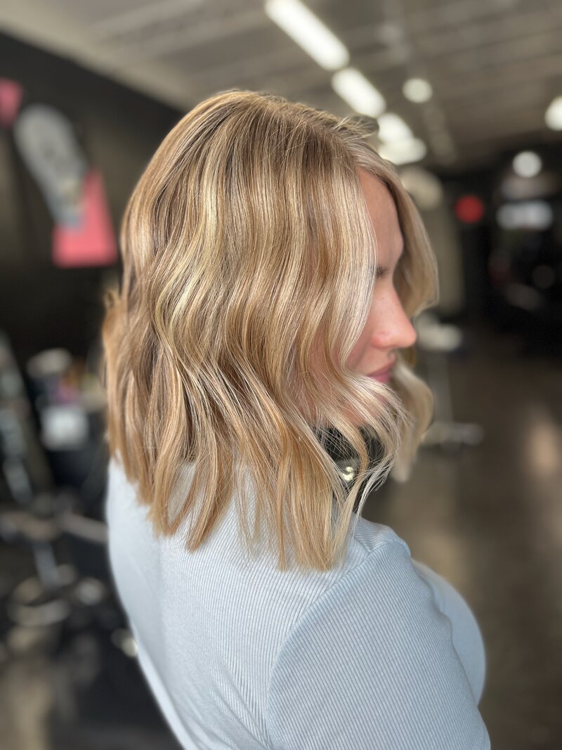 Woman with short blonde hair