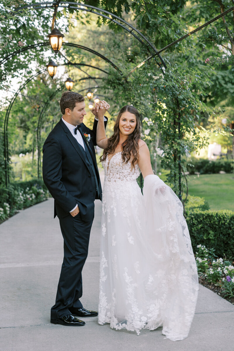 Groom spins bride after outdoor ceremony | Fresno Photographer Ashley Norton