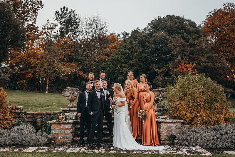 wedding party pose for photo