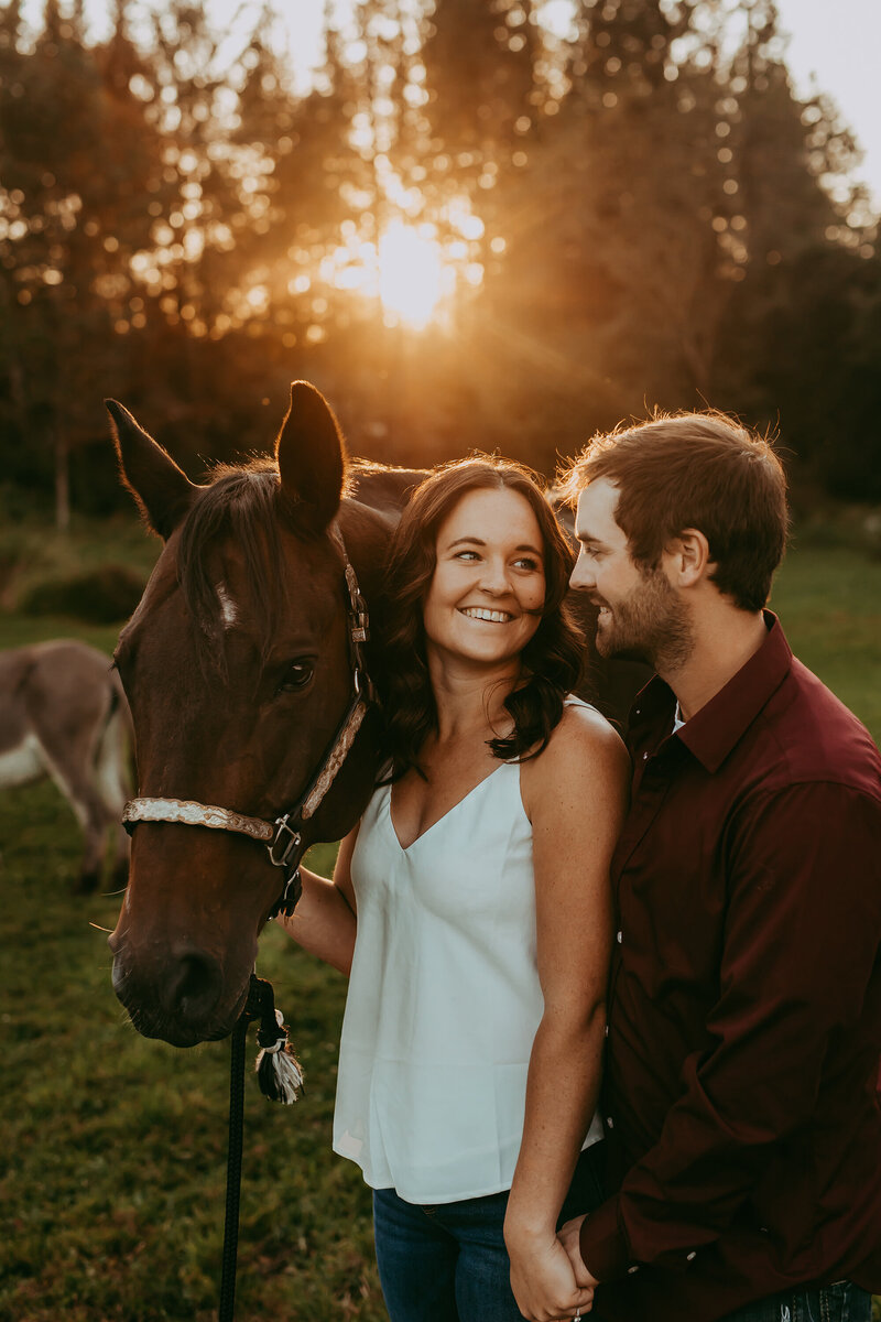 couple-with-horse-smiling