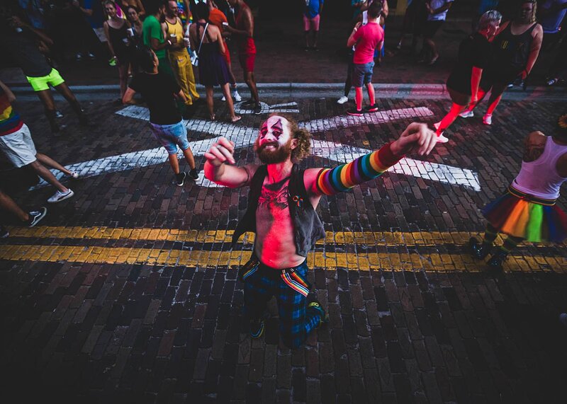 Pride LGBTQ+ dancers dancing in the streets