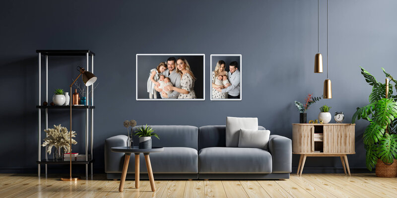 professional newborn photography artwork hanging in modern living room hamilton, ON