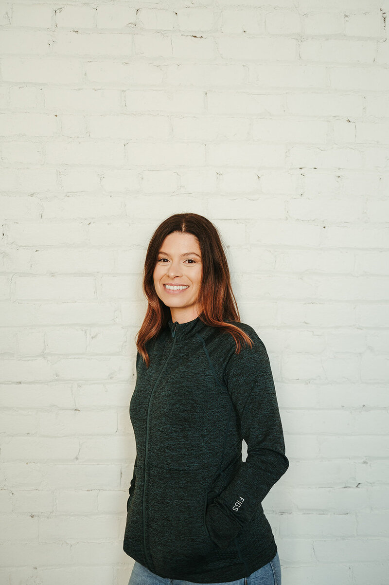 Kalispell Denture Studio's head lab technician, Katy, smiles at the camera.