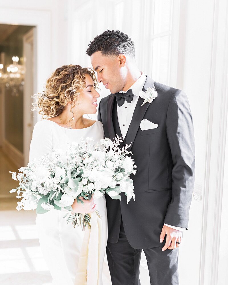Bride and groom walk up memorial steps at their DC wedding