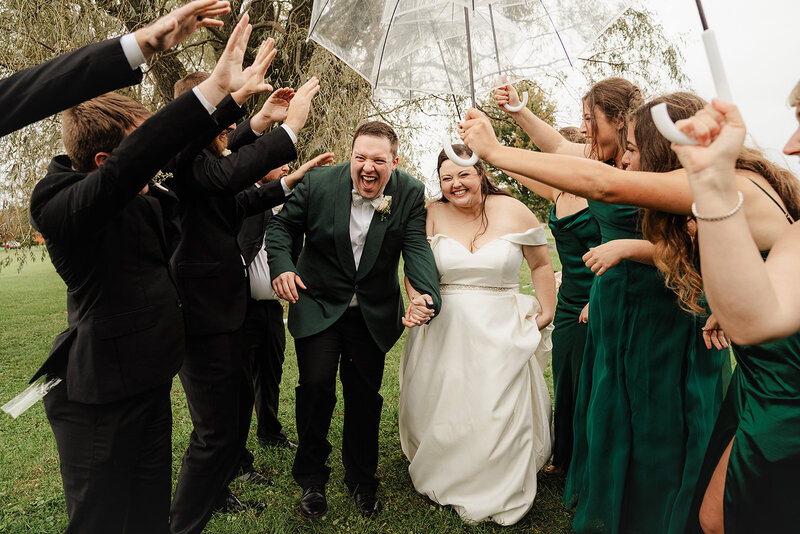 couple with bridal party