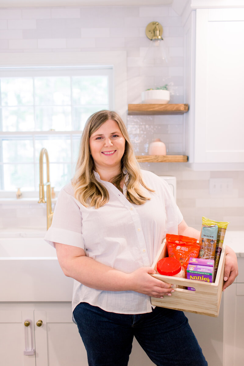 A professional photo of Caroline, the owner of Tidyish Home Organizing