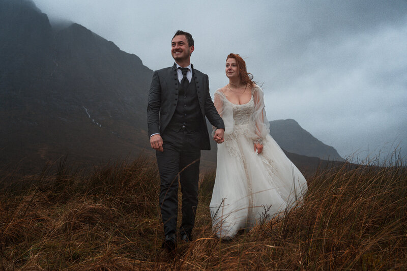 Couple hold hands during their Glencoe Elopement