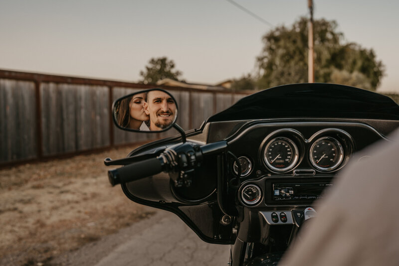 motorcycle rearview mirror of couple