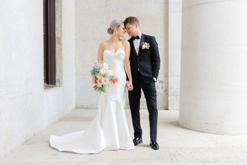bride and groom at the Ohio state on their wedding day. A classic, timeless portrait.