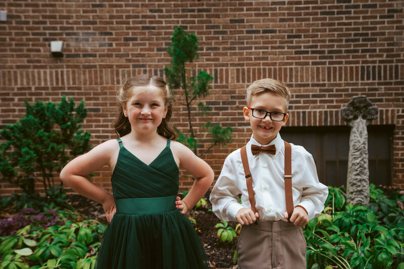 two young kids in formal attire