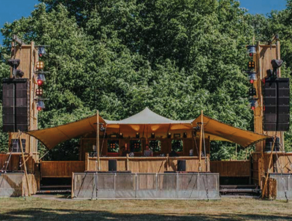 A Pagoda next to a frame marquee being used for an entrance