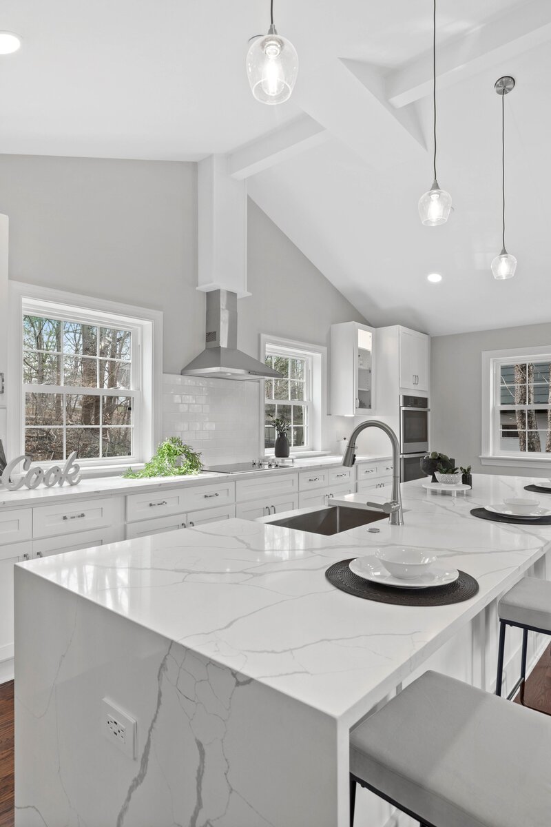 White kitchen with vaulted ceiling in Maryland home for sale