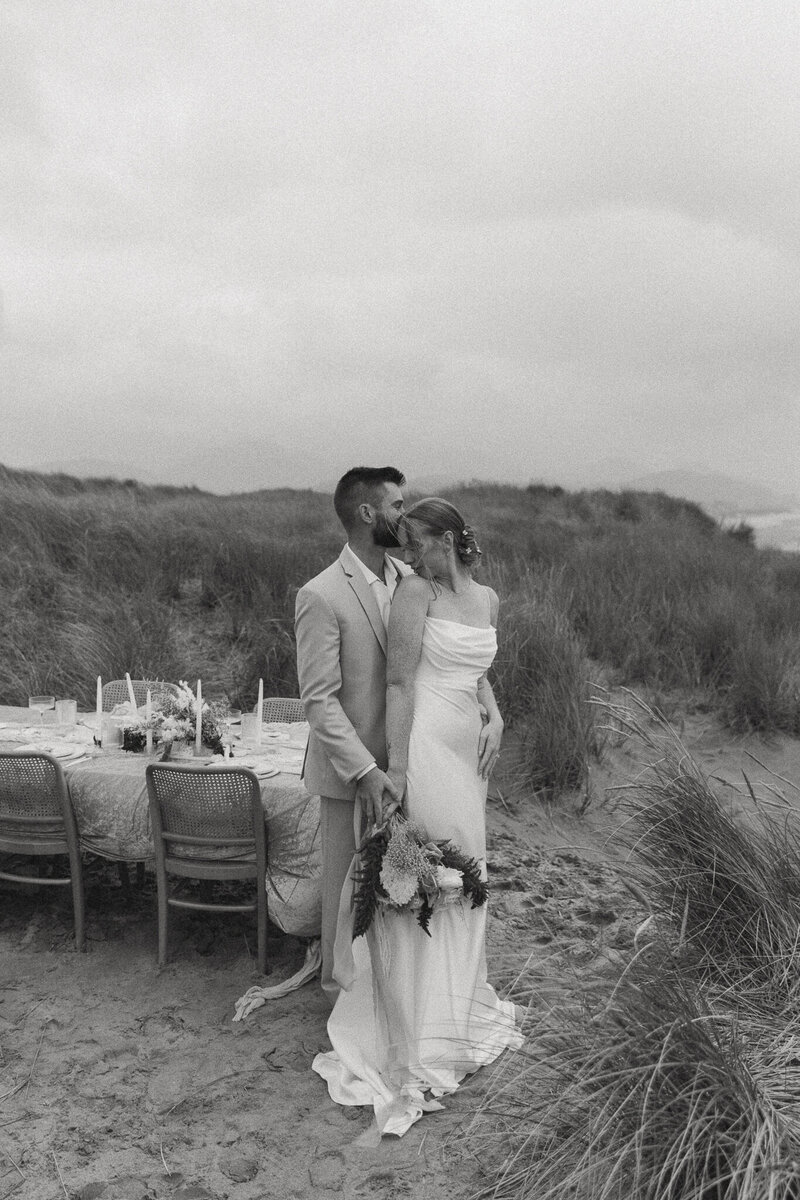 couple holding hands captured by their fernie wedding photographer