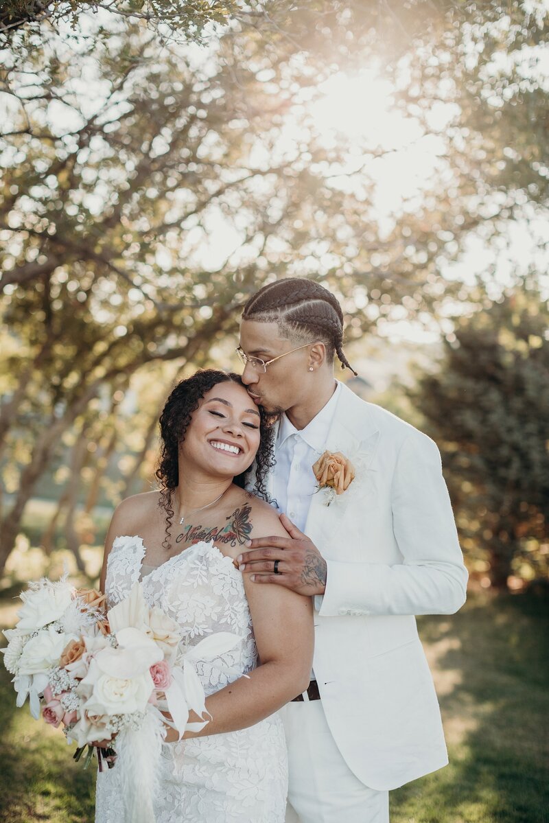 Colorado wedding couple at the base of a mountain