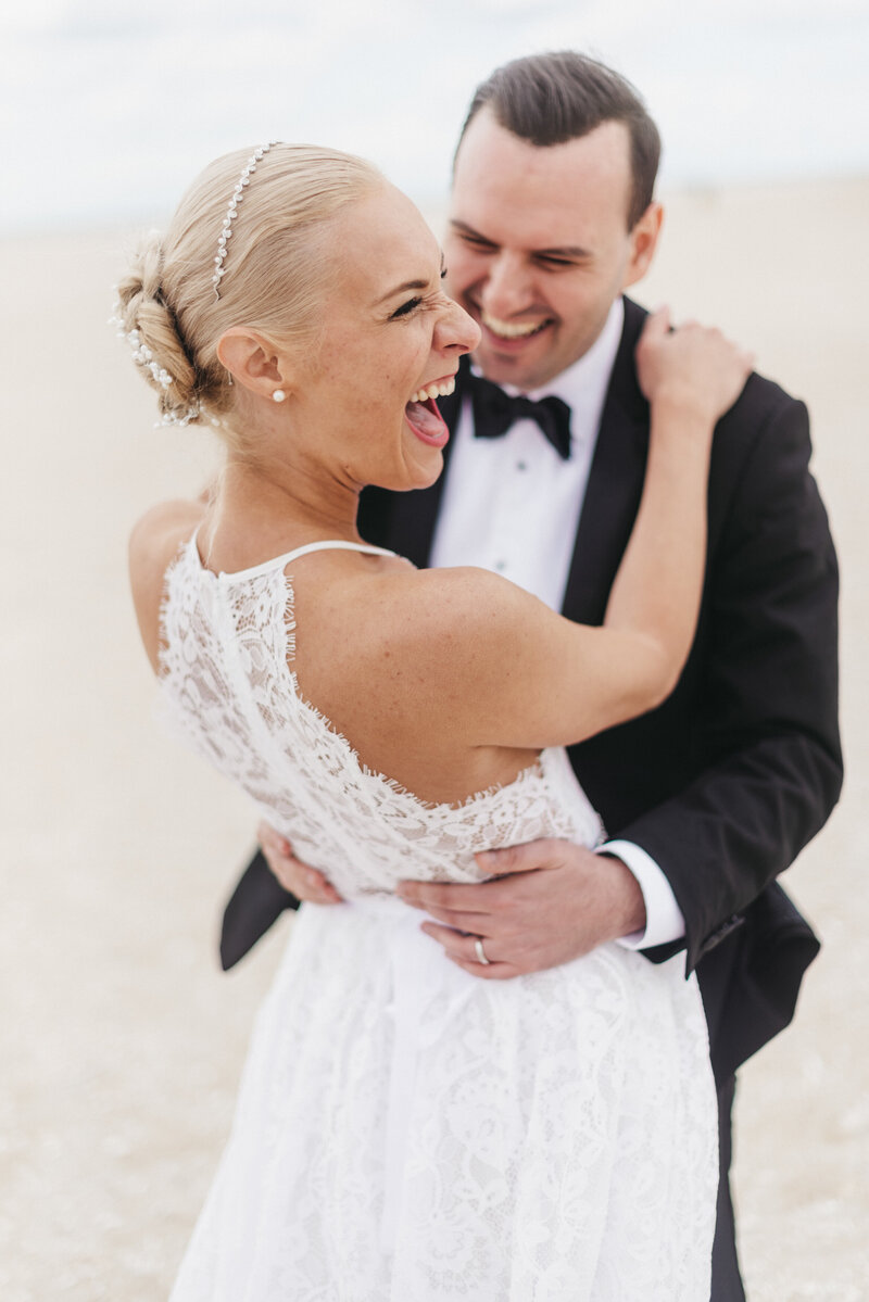elopement couple laughing and having fun
