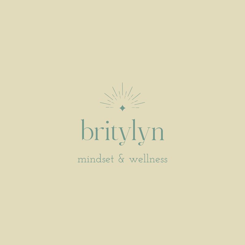 Logo design for Britylyn Mindset & Wellness coach with starburst and aesthetic typography design