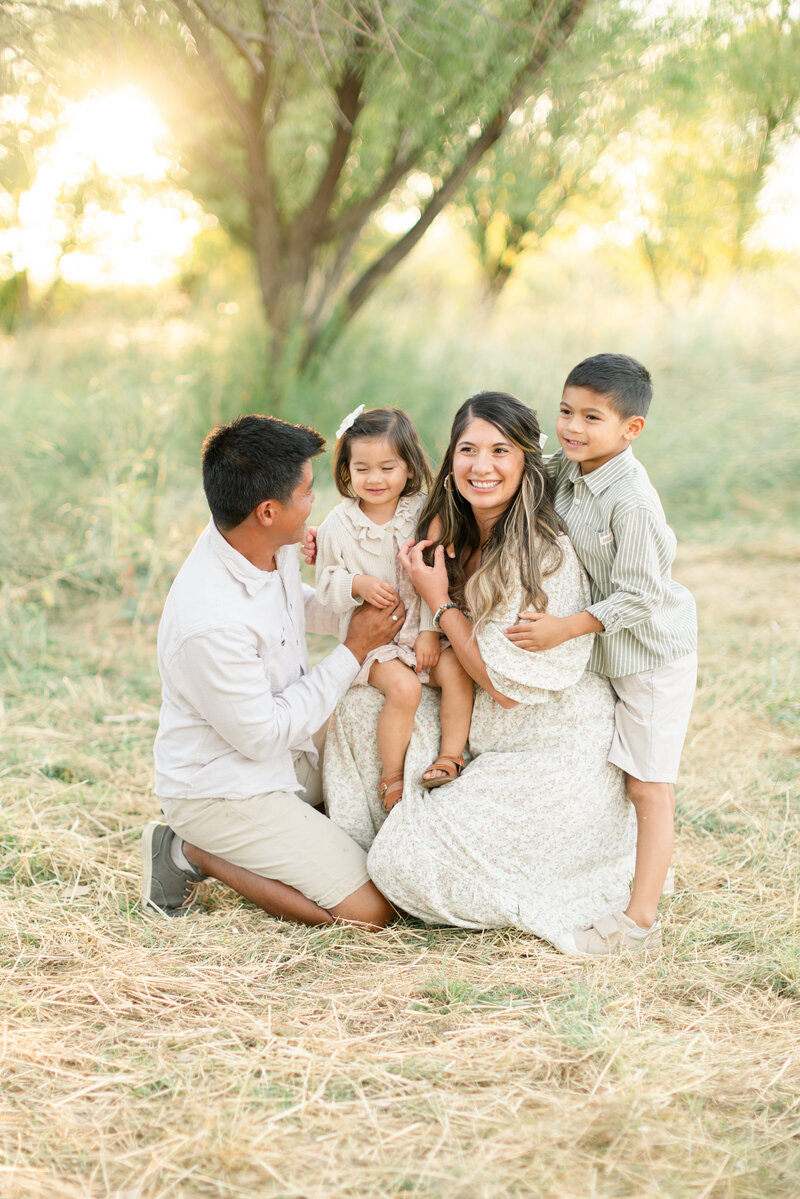 In-studio Maternity Session with floor floral arrangments for mother's day minis photoshoot