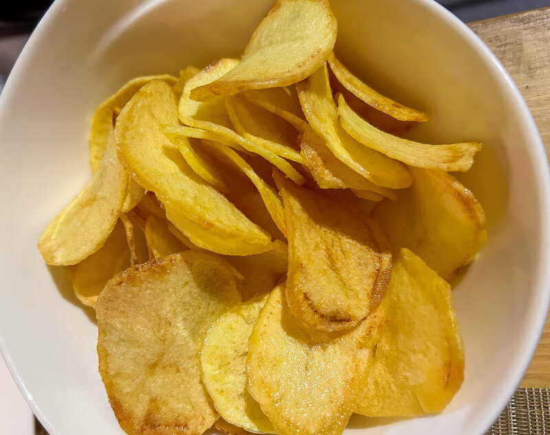 Side of homemade potato chips at Hosteria Stoppani  in Milan, Italy