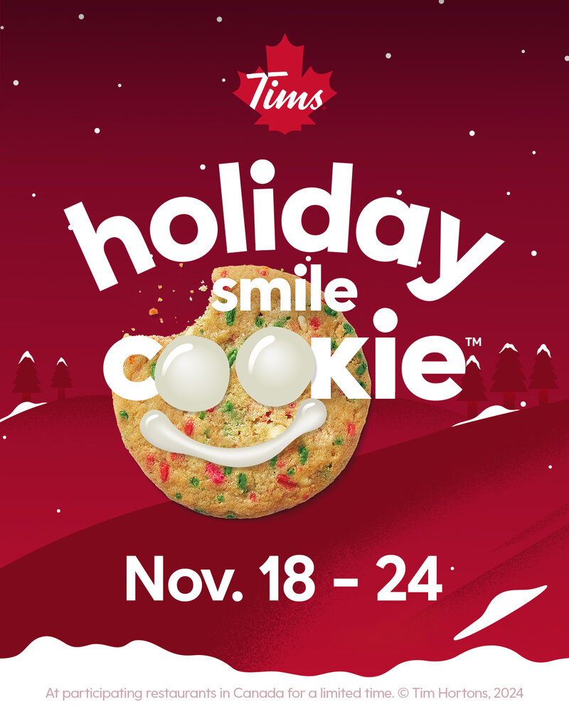 Owners helping decorate Smile Cookies
