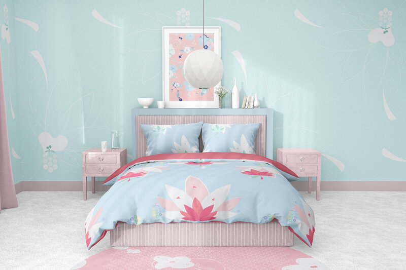 Bedroom with blue, white, and pink floral bedspread and patterned wallpaper
