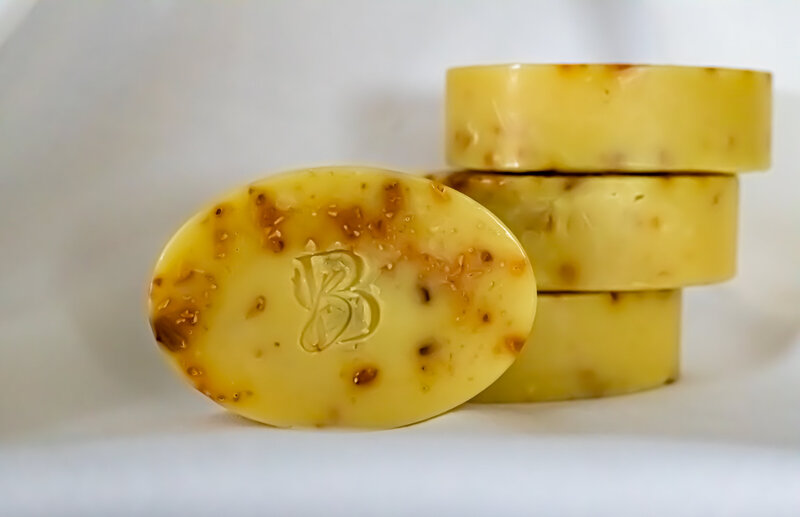 Handcrafted oatmeal glycerin soap bar with rose petals and natural ingredients