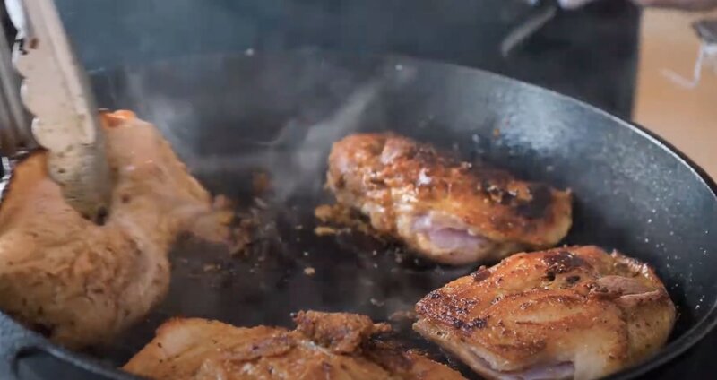 Gator being cooking in a skillet 