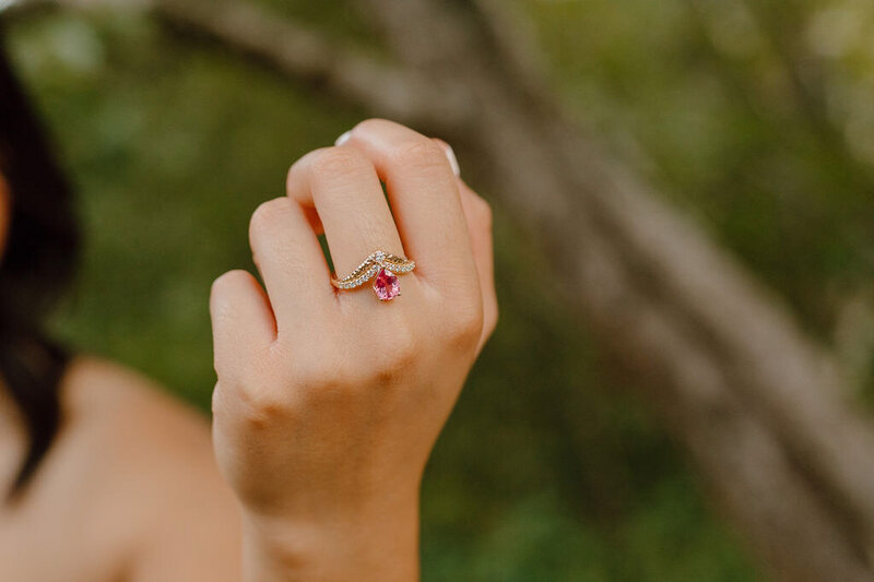 unique pear shaped spinel ring in 14k gold with natural diamonds