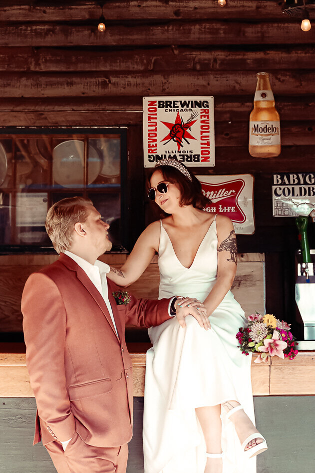 A couple poses on their wedding day at Fitzgerald's in Berwyn, Illinois, captured on film
