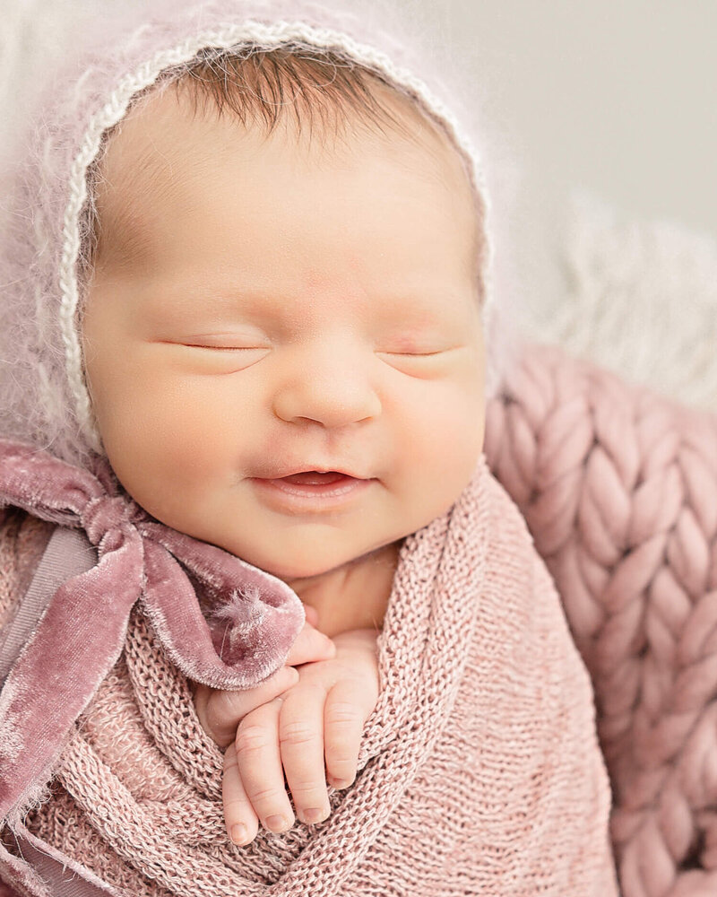 baby newborn girl wearing pink in Portland Oregon Baby Photography session