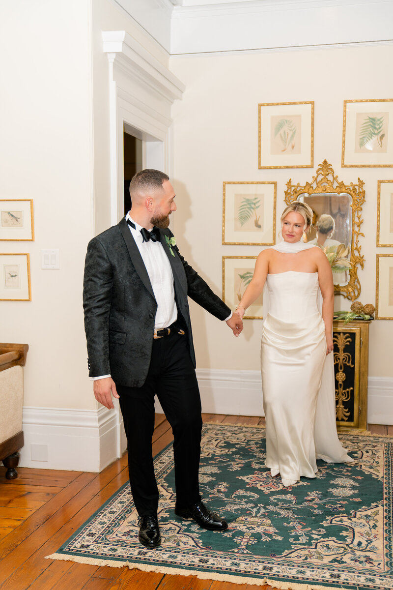 Wedding Photographer Newport RI | Rhode Island Caprio Captured Photography | Bride And Groom Holding Hands In An English-Inspired Estate