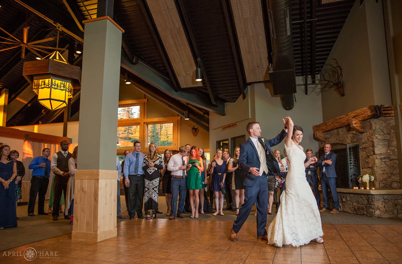 Dance floor wedding reception inside Four Points Lodge