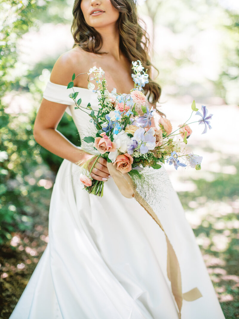 Bride With Long Brown Hair With Lavender Peach and Pink Bouquet